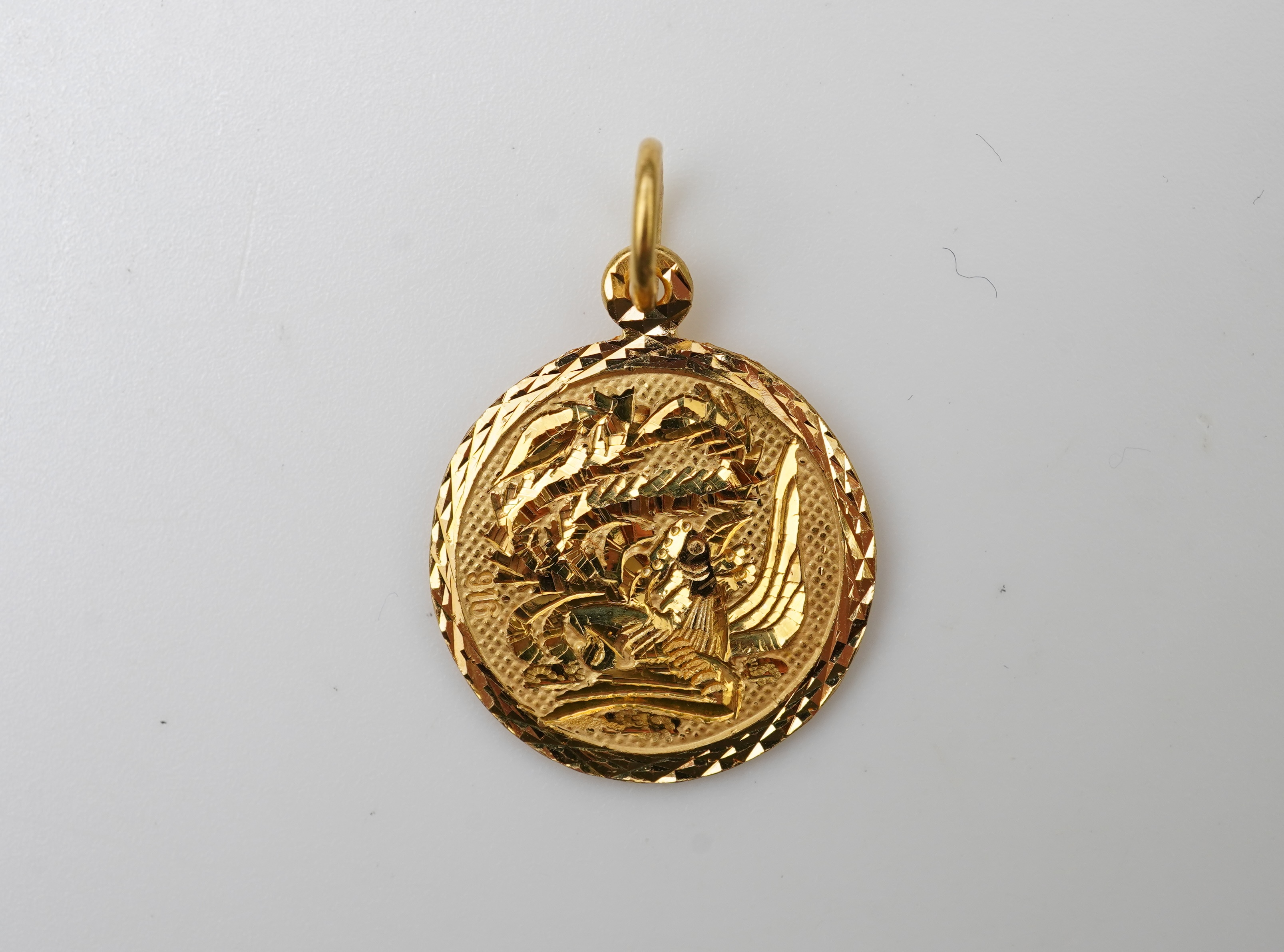 Two pendants and a pair of earrings